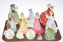 Collection of twelve Doulton figures including Daydreams, Autumn Breezes, etc.