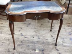 Mahogany ladies writing table of shaped form on cabriole legs, 73cm by 92cm by 54cm.