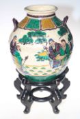 Large Chinese vase with figure decoration, 30cm, with wood stand.