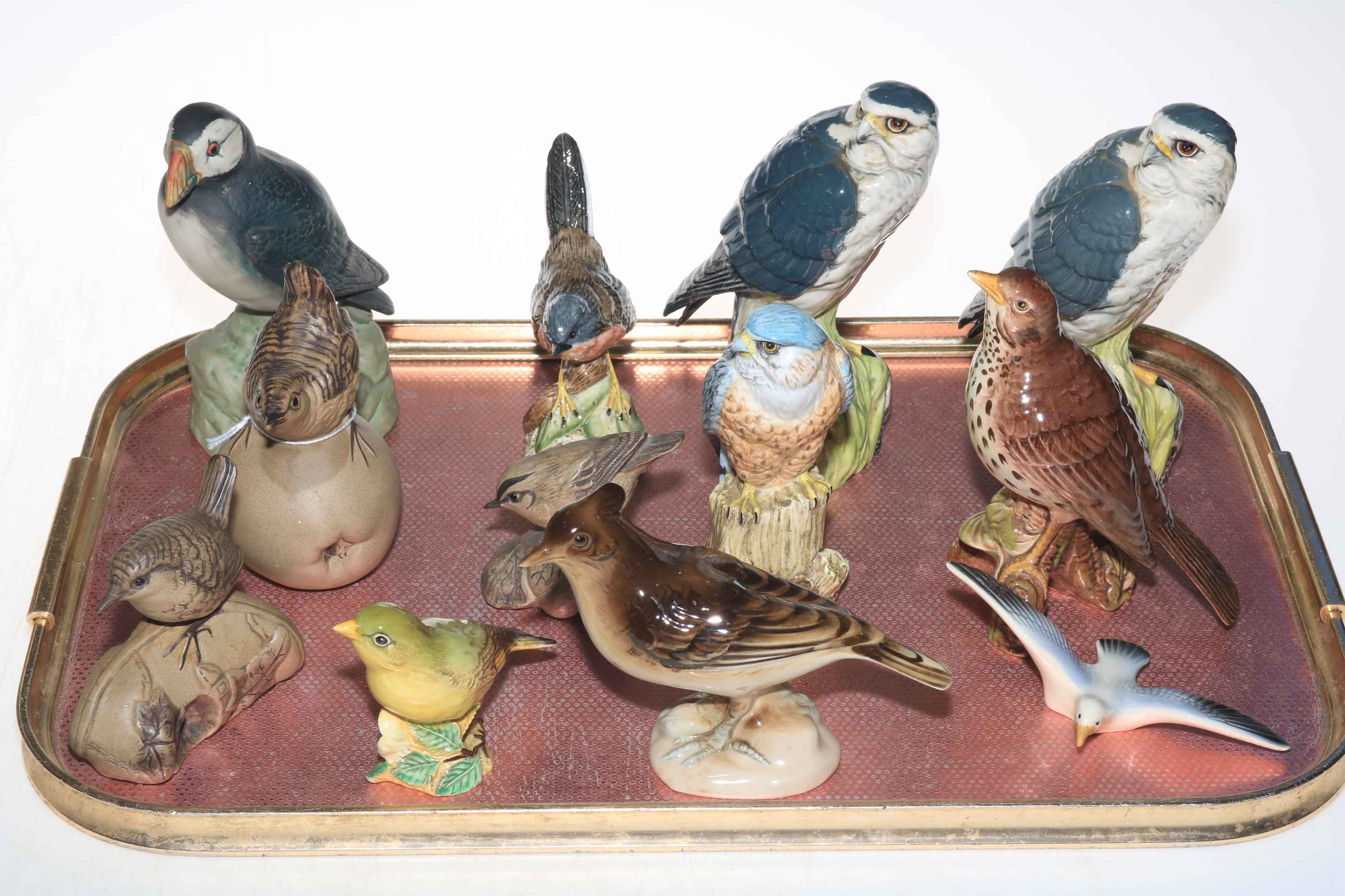 Collection of twelve bird ornaments including Beswick Beneagles Merlin, Poole and others.
