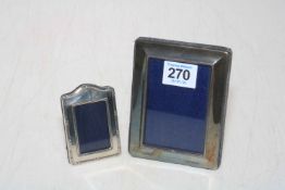 Two small sterling silver photograph frames, 7.5cm and 12cm high.