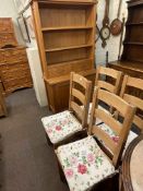 Modern oak shelf back dresser and set of four beech bar back kitchen chairs.