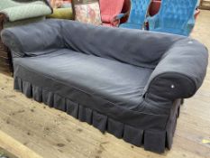 Early 20th Century Chesterfield settee with removable loose cover.