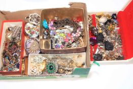Two boxes of costume jewellery.