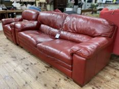 Red stitched leather three seater settee and chair.