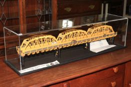 Cased model of 'The White Nile Bridge' made by The Cleveland Bridge Co, 88cm length.