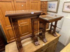 Pair mahogany two tier lamp tables,