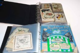 Two albums housing Victorian greetings cards, postcards, funeral antique cards, etc.