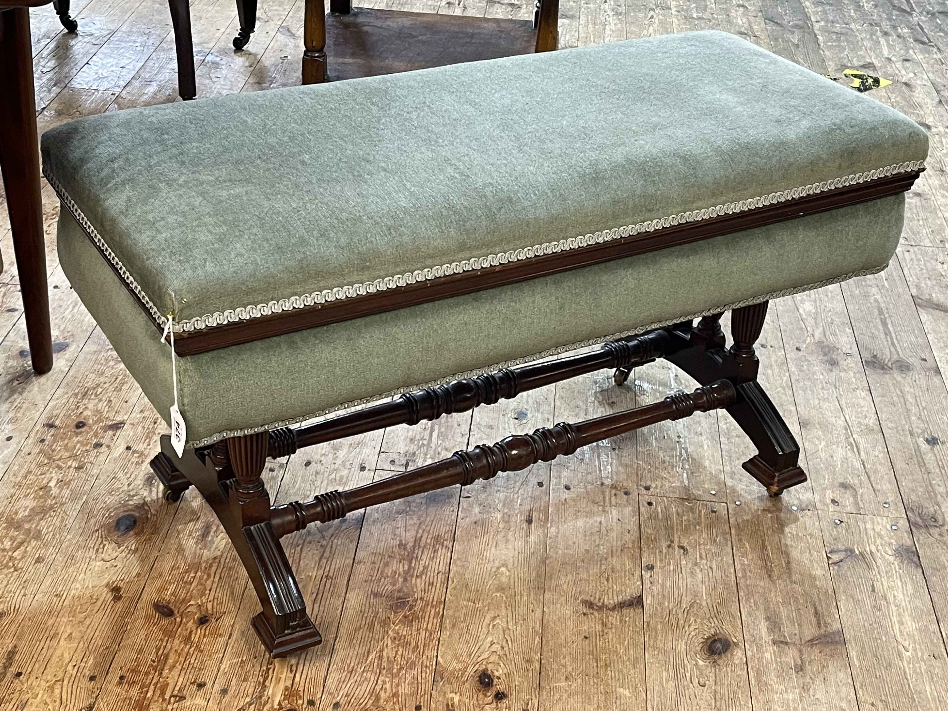 Late Victorian mahogany duet stool in green draylon, 54cm by 92cm by 40cm.