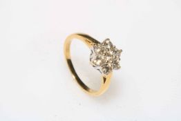Diamond seven stone cluster and 18 carat gold ring, size L (total approximate 0.75 carat).