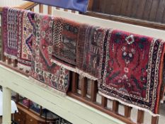 Collection of six various Persian design rugs (largest 1.80 by 0.78).