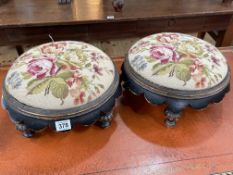 Pair Victorian circular footstools in floral needlework.