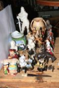 Collection of decorative figurines and porcelain including Royal Doulton, Country Artists,