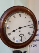 Circular mahogany cased fusee wall clock.