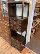 Oriental style brass mounted slim cabinet having four cupboard doors,