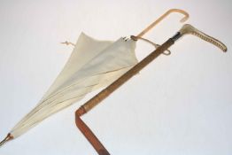 Silver mounted riding crop, London 1931, and ladies parasol (2).