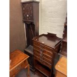 Edwardian mahogany five drawer music cabinet and 1920's oak clock case (2).