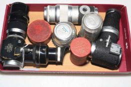 Collection of Leica Leitz lenses and housings: Summaron 3.5cm 1:3.5, Hektor 13.5cm 1:4.