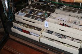Large collection of costume jewellery in two fitted boxes.