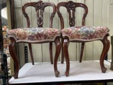 Pair Victorian mahogany parlour chairs with floral needlework seats.