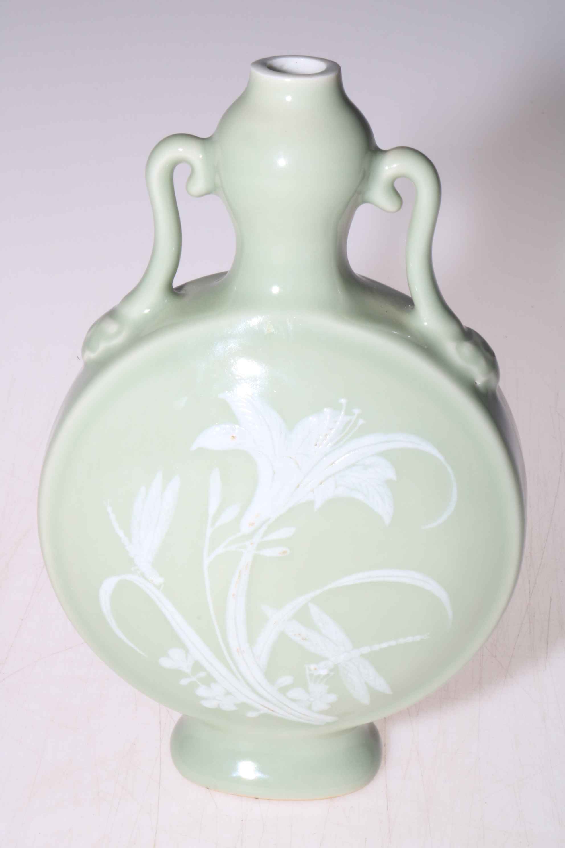 Chinese moon flask twin handled vase with floral pattern on pale ground, 21cm high. - Image 2 of 3