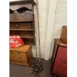 Two antique cornice poles with brass runners and fittings, one with acorn finials,