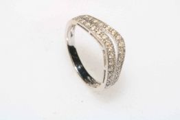 Diamond set twin wave 18 carat white gold ring, size N.