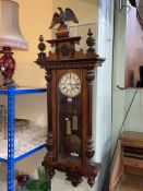 Gustav Becker Victorian walnut cased double weight Vienna wall clock.