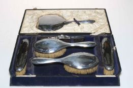 Silver backed six piece brush set, cased.