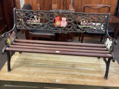 Cast metal and four wood slat child's garden bench.