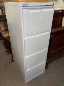 Four drawer metal filing cabinet, nest of four and nest of three mahogany tables,