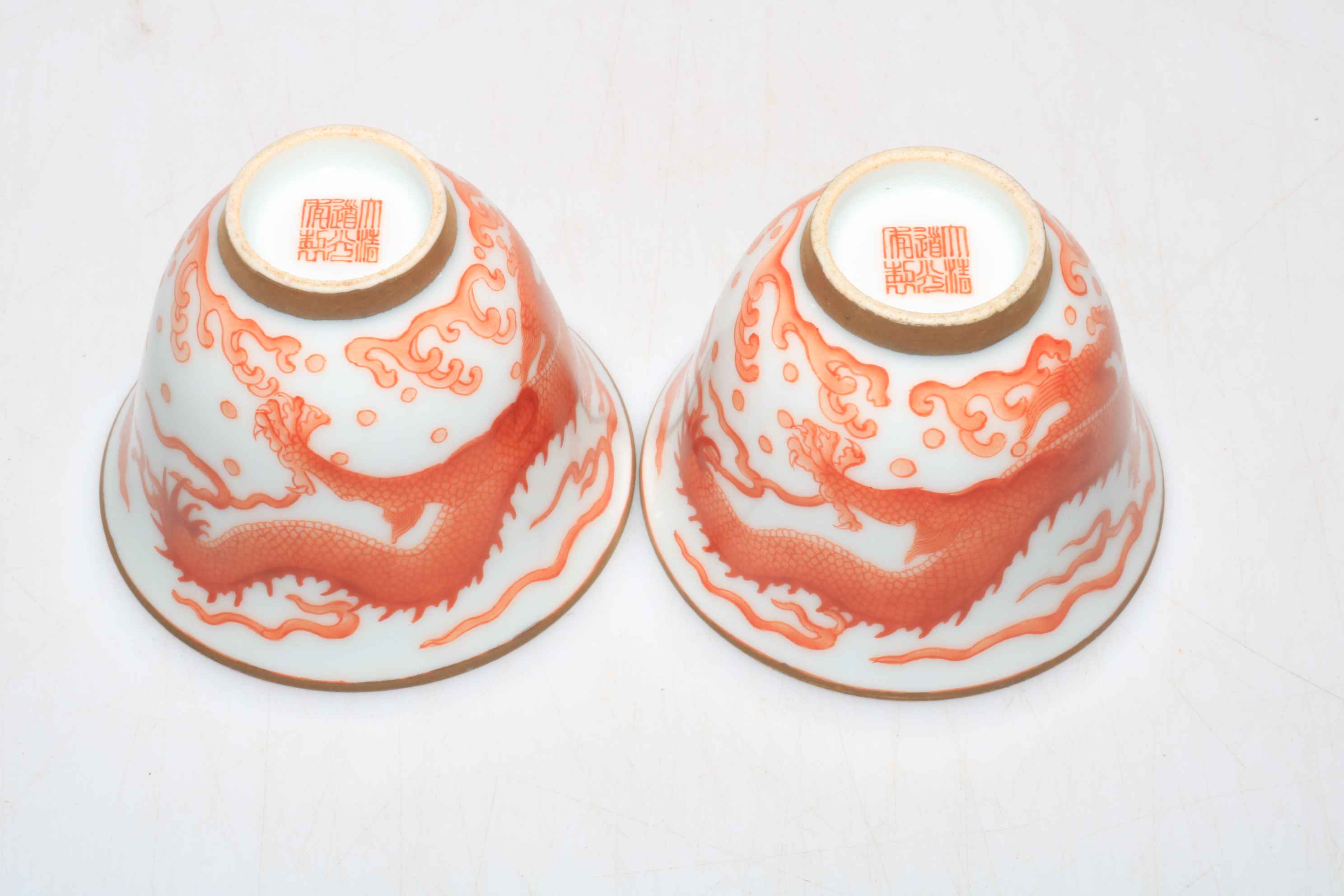 Pair Chinese iron red dragon tea bowls. - Image 2 of 2