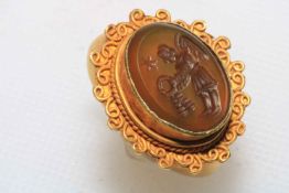 Early gold ring with intaglio, possibly Roman.