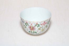 Chinese famille rose tea bowl with formal decoration, six character mark, 9.5cm diameter.