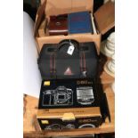 Collection including camera, lenses, stands including vintage Leica handbook and manuals,