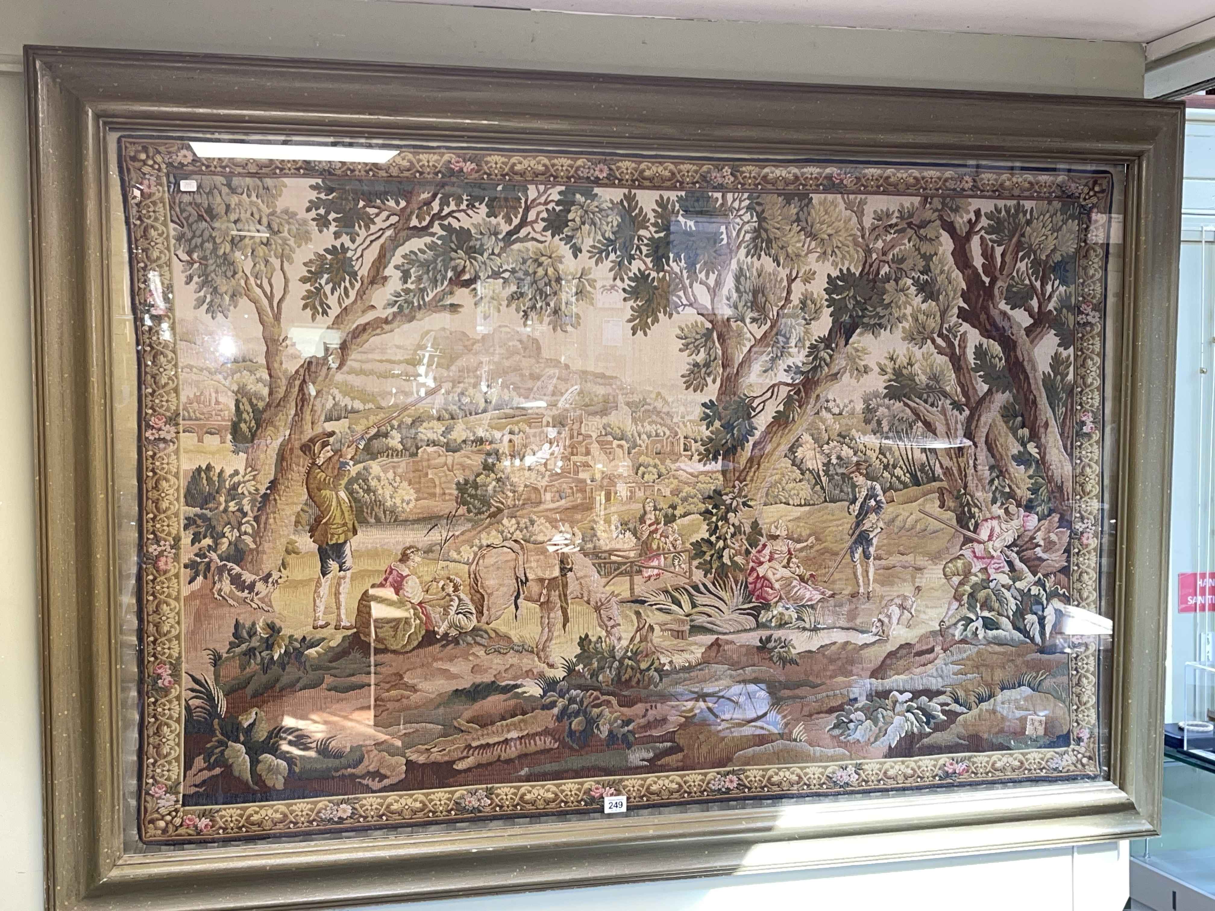 Large framed tapestry depicting male and female figures, a day out in the country,