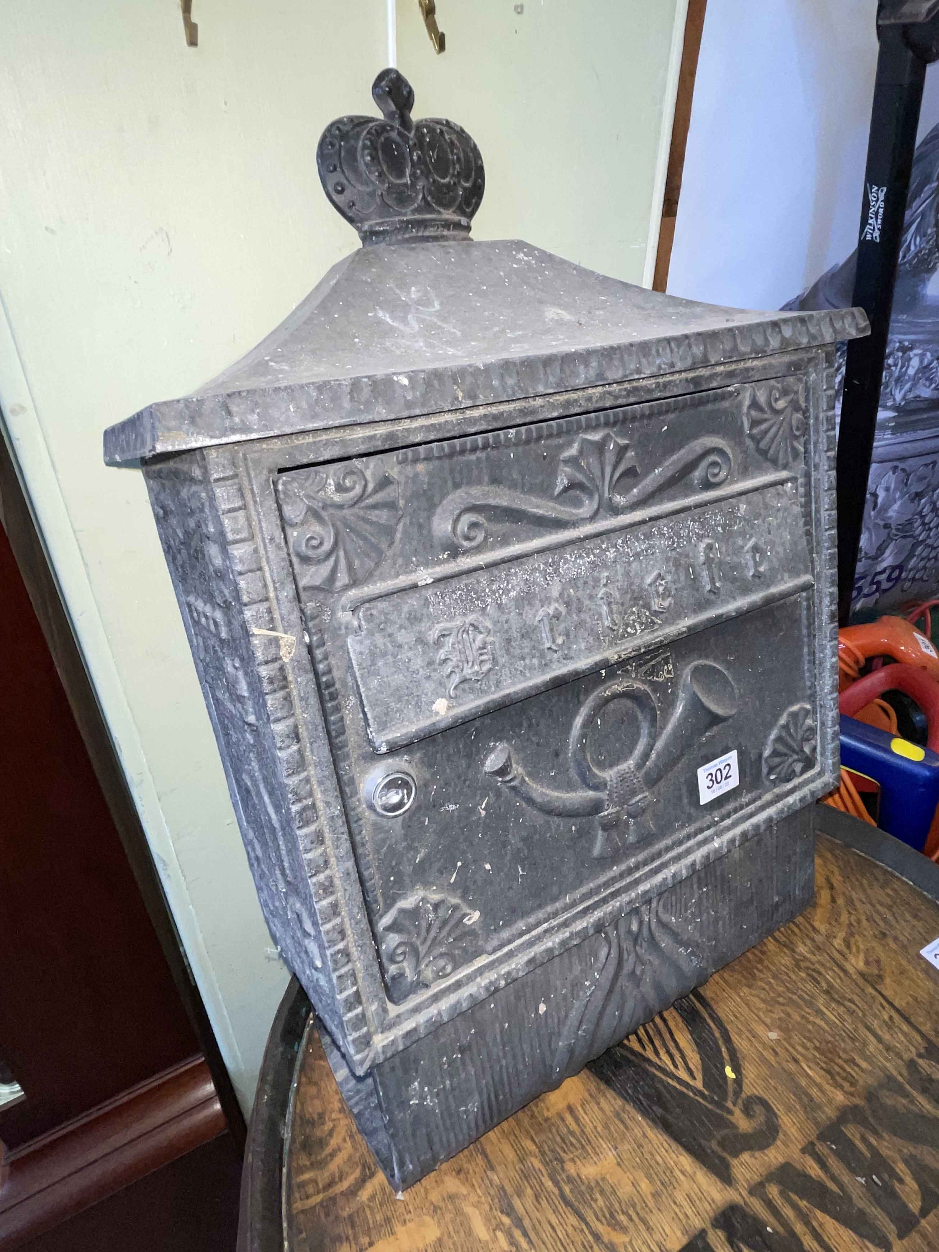 German cast metal letter box and newspaper holder.