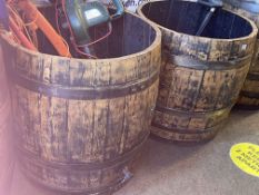 Pair of large oak and metal coopered barrel planters.