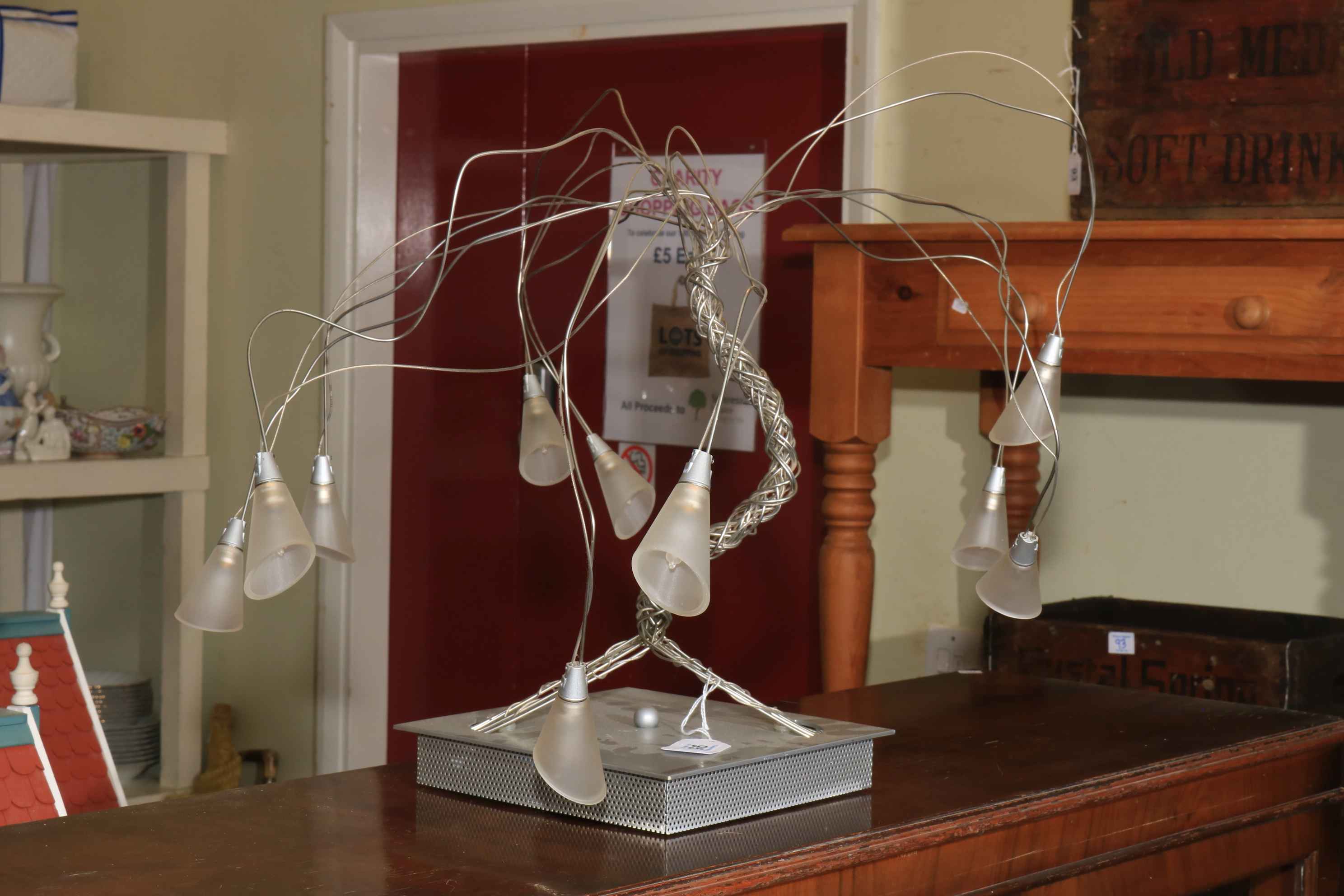 Modern designer twist wire chandelier.