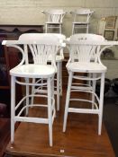 Set of five and one white painted bar stools.