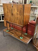 1950's rosewood two door drinks cabinet and rosewood and chrome finish rectangular coffee table.