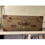 Vintage canvas and leather bound travelling trunk.