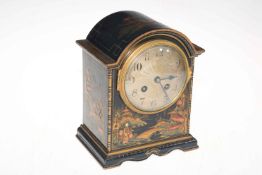 Japanned mantel clock with striking French movement, 21cm.