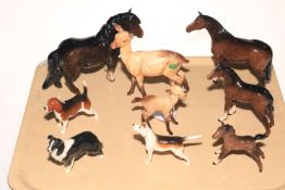 Beswick horses and foals, Beswick deer and fawn and three dogs.