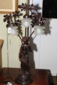 Ornate spelter three leaf branch lady table lamp.