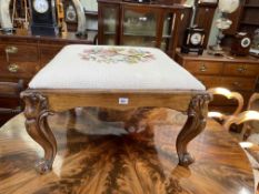 Large Victorian mahogany footstool in floral needlework, 41cm by 72cm by 67cm.