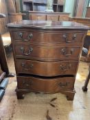 Mahogany four drawer serpentine front chest, 74cm by 59cm by 44cm.