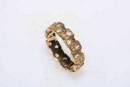 9 carat gold white stone eternity ring, size O.