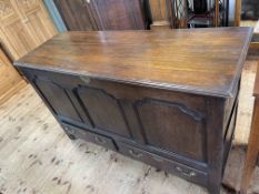 Antique oak triple arched panel front mule chest with two base drawers, 92cm by 150cm by 53cm.