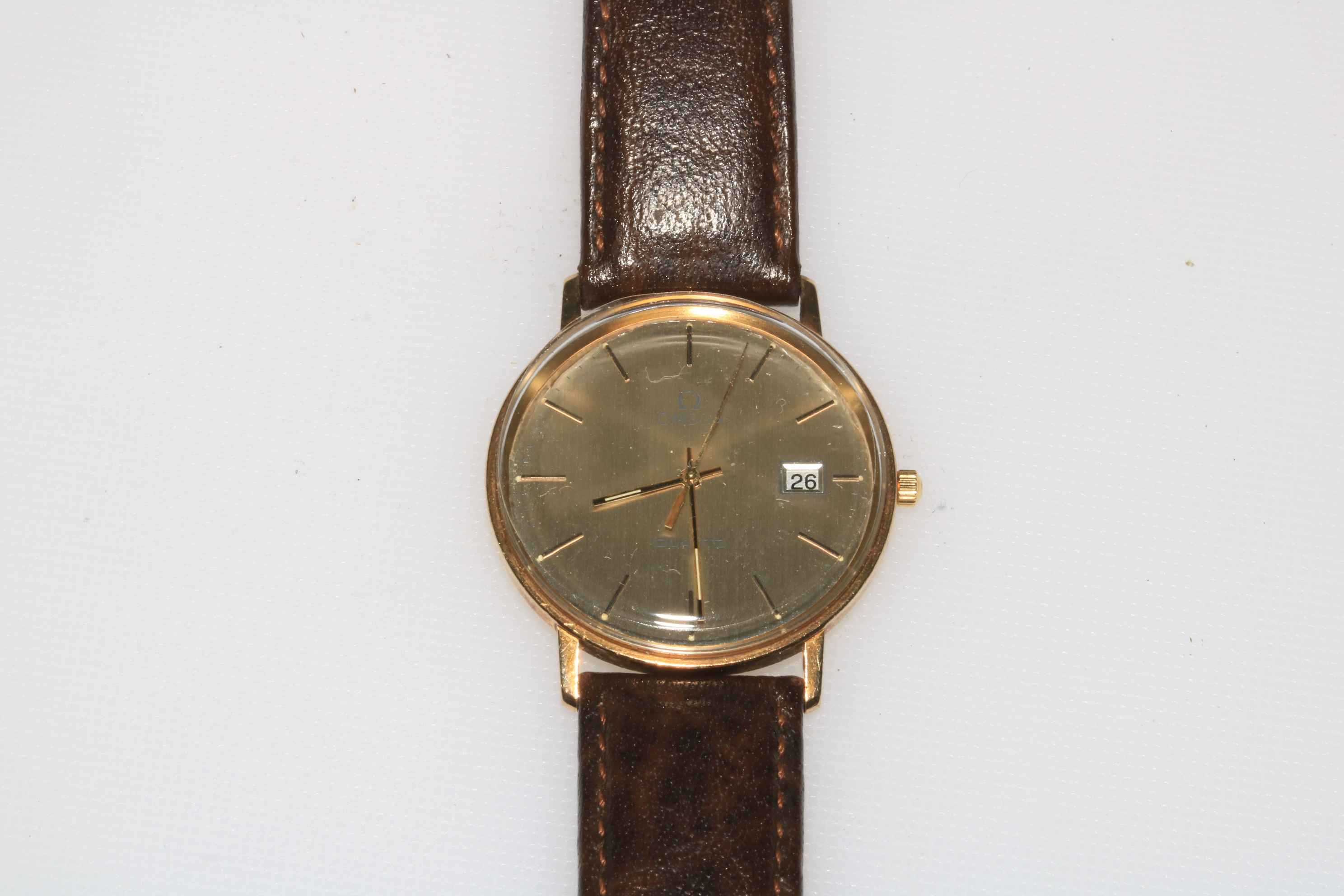 Omega Quartz 9 carat gold gents wristwatch with date.